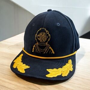 Corduroy Snap Back Hat featuring embroidered US Navy Diving with gold embroidery